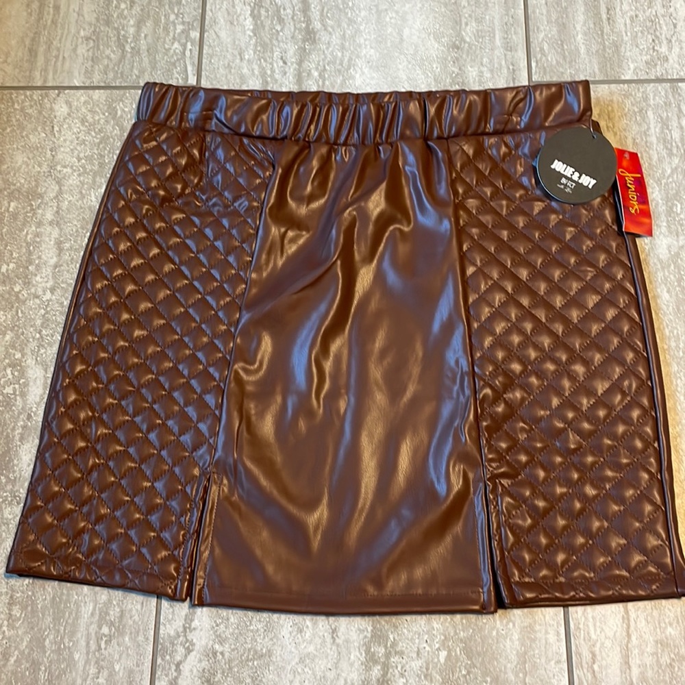 Julie & Joy faux leather skirt- 2 front slits and small squares sewn as design